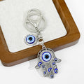 Hamsa Hand and Evil Eye Charm Keychain in Gold and Silver Tone view 12