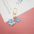 Gold Tone Enamel Flower Duo Charm Keychain with Lobster Clasp view 9
