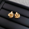 Interlocking Knot Stud Earrings in Gold Tone and Silver Tone view 6