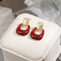 Red Translucent Open Square Gold Tone Stud Earrings view 3