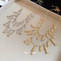 Layered Fish Charm Necklace in Gold and Silver Tones view 4