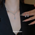 Silver Tone Crystal V Necklace and Teardrop Earring Set view 4