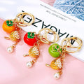 Persimmon and Lotus Pod Keychains in Three Colors and Random Color Option view 9