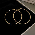 Minimal Thin Round Hoop Earrings in Gold and Silver view 10