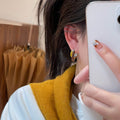 Red Yellow and White Enamel Overlapping Clip Earrings view 4