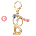 Gold Tone Initial Letter Keychain with Evil Eye and Pink Tassel view 9