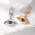 Large Gold and Silver Tone Blue Eye Clip Keychains view 1