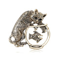 Cat Fishing Brooch With A Textured Cat Leaning Over A Round Frame With A Dangling Fish view 5
