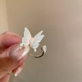 Two Silver Tone Butterfly Open Rings With Translucent Or Blue Crystal Wings view 4
