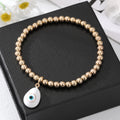 Gold Tone Beaded Teardrop Evil Eye and Hamsa Charm Bracelets view 7