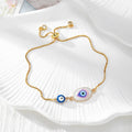 Gold Tone Blue Evil Eye Double-Dangle Slider Bracelets in Eight Designs view 10