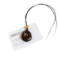 Brown Oval Resin Pendant Cord Necklace with Distinctive Textured Details view 5
