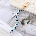 Gold Tone Colorful Evil Eye Bead Clip Keychains in Seven Colors view 4