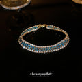 Gold Tone Three Row Bracelet With Teal And Clear Crystals view 3