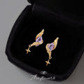Gold Tone Purple Faceted Stone Wing And Star Drop Stud Earrings view 1