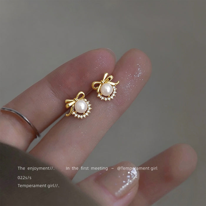 Gold Tone Bow White Pearl And Sunburst Stud Earrings