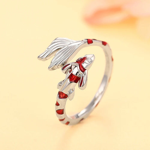 Silver koi open ring side view showing tail and red body marks