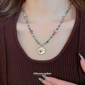 Green and Brown Beaded Celestial Medallion Necklace view 1