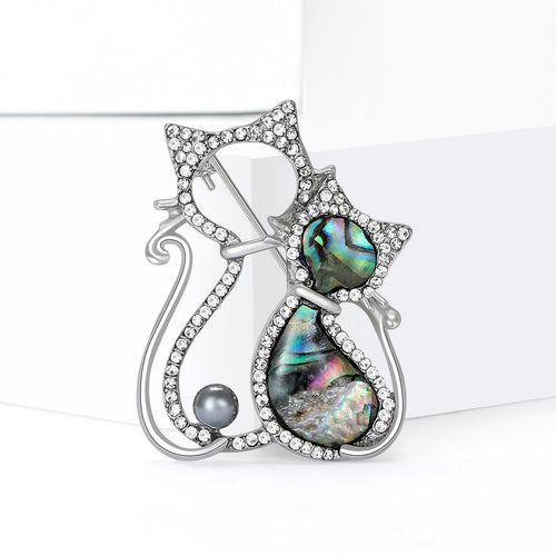 Angled display of Crystal Double Cat brooch