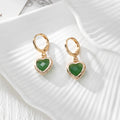 Gold Tone Crystal Heart Huggie Earrings in Seven Color Options view 8