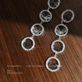 Silver Pave Butterfly Four Disc Long Drop Earrings view 3