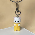 Flocked White Cat Clip Keychains in Nine Outfit Colors view 8
