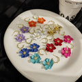 Ten Color Layered Five Petal Flower Gold Tone Hoop Earrings view 1