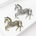Filigree Crystal Horse Brooch In Silver And Antique Gold view 3