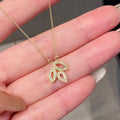Crystal Leaf Pendant Necklace in Gold Tone Polished Metal Jewelry view 2