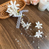 White Floral Tassels