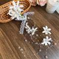 White Flower Lace Duckbill Hair Clip With Pearl Like Long Tassels view 6