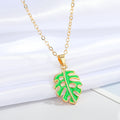 Gold Tone Green Monstera Leaf Necklace and Huggie Earring Options view 3