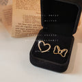 Gold Tone Asymmetric Hollow Bow And Pave Heart Stud Earrings view 1