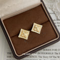 Gold Tone Clear Stone Square Frame Engraved Floral Stud Earrings view 6