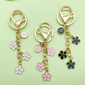 Gold-Tone Initial Letter Keychain With Three Flower Charms view 2