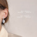 Silver-Tone Embossed Rose Oval Pendant Drop Earrings view 3