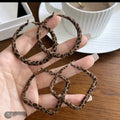 Brown Patterned Fabric Hoop Earrings With Round Silhouette view 1
