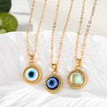 Gold Tone Round Evil Eye Cabochon Pendant Necklaces view 1