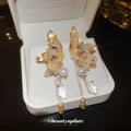 Gold Tone Crystal Butterfly Wing Drop Stud Earrings view 3