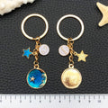 Six Blue Zodiac Moon and Star Metal Keychain Designs view 3