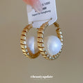 Gold Tone Textured Hoop Earrings With Oversized Pearl Centers view 2