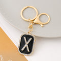 Rhinestone Initial Letter Keychain Black Enamel Gold Tone Tag view 3