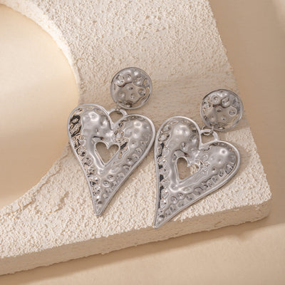 Primary supplied view of hammered open heart dangle earrings