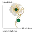 White Shell Flower Brooch With Decorative Crystal And Enamel Details view 5