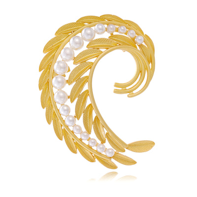 Front view of the curved wheat metal brooch