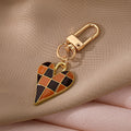 Gold Tone Checkered Heart Enamel Clip Keychains in Four Colors view 3