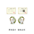 Gold Tone Green Leaf White Cat And Orchid Scene Stud Earrings view 3