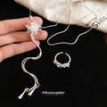 Silver Starburst Firework Y Lariat Necklace Tassel view 2