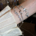 Silver Tone Leaf And Crystal Bracelet With Butterfly Detail view 2