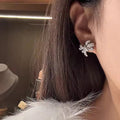 Silver Tone Bow Stud Earrings with Clear Baguette CZ view 3